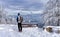 Tourist, cross country skier with backpack admires Tatra Mountains panorama