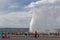 Tourist crowd at Old Faithful eruption