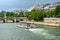 Tourist cruise boat on Seine river waterfront, Paris