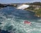 Tourist cruise Ship boat under Rainbow on The Niagara River visiting the Water Falls on a sunny Summer Day Hornblower