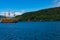 Tourist cruiser and vermilion Tori gate on Ashi lake, Hakone