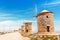 tourist destination - old Windmills in the Mandraki port of Rhodes, Greece