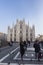 Tourist in Dome square in front of Milan`s Dome