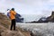 Tourist on the edge of Svinafellsjokull Glacier in Skaftafell Natural Park