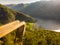 Tourist enjoying fjord view on Stegastein viewpoint Norway