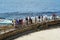 Tourist enjoying sunny day at La Jolla Cove.