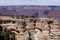 Tourist enjoying the view of the west rim of The Grand Canyon