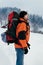 Tourist enjoys fresh air snowy mountain forest landscape