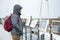 Tourist exploring Whitehaven harbour in Cumbria, England, UK