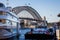 Tourist ferries moored at Circular Quay in front of Sydney Harbour Bridge in Sydney, NSW, Australia