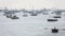 Tourist and fisher boats by the harbour