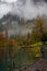 Tourist fishing for trout at Blausee lake
