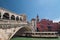 Tourist float in boat under Rialto bridge on Grand Canal, Venice