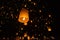 Tourist floating sky lanterns in Loy Krathong festival , Chiang Mai ,Thailand