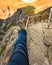 Tourist foot shoe on Trollstigen viewpoint in Norway