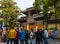 Tourist in front of entrance archway or Shanmen of historic Buddhist Jinshan Temple