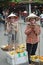 Tourist and fruit vendor, Hoi An, Vietnam