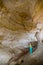 Tourist girl in Cappadocia cave