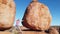 Tourist girl at Devils Marbles