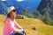 A tourist girl sitting in Machu Picchu, Peru