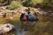 Tourist helps wash an elephant