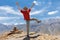 Tourist hiker hands up on mountain top