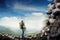 Tourist with hiker poles looking up