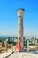 Tourist on the hill Byrsa at the Roman marble column. Ruins of Carthage, Tunisia