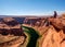 Tourist at Horseshoe Bend on Colorado River