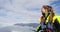 Tourist on Iceland Jokulsarlon Glacier Lagoon glacial lake in rubber boat zodiac