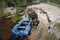 Tourist inflates a rubber boat