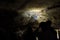 Tourist inside Victoria Fossil Cave in Naracoorte Caves National Park South Australia