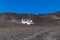Tourist jeep truck descending from the top of Etna volcano