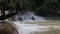 Tourist jumping into water