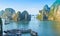Tourist junks floating archipelago top view. Cruise traditional ship wooden junk sailing Ha Long Bay, Vietnam UNESCO World