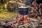 Tourist kettle of boiling food over a campfire