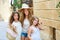 Tourist kid girls group in mediterranean white town