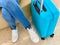 Tourist legs and travel bag
