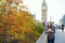 Tourist in London walking on with coffee