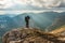 Tourist looks at mountains