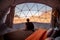 Tourist man in dome tent at Wadi Rum, Jordan