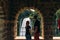 Tourist man and girl, couple in love look at waterfall in Italy Cascata delle Marmore in Umbria. Large water pressure, discharge