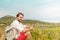 Tourist man taking a break while mountain trip