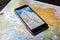 Tourist maps of Poland and a mobile phone for guided exploration