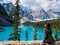 Tourist at Moraine Lake in Banff National Park, Alberta, Canada