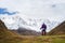 Tourist in a mountain trekking near the top of Shkhara, Svaneti