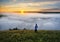 Tourist over the fog. morning fog in the canyon of the river