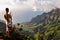 Tourist overlooking Kalalau Valley - Kauai, Hawaii