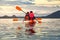 Tourist paddling the kayak