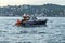 Tourist passenger motor boat on the Bosphorus strait, Sea front